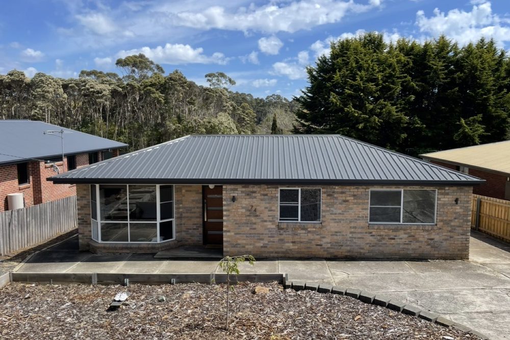 Roof coated in deep charcoal, after